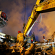 Iranian firefighters remove debris of the Plasco building which was engulfed by a fire and collapsed, in central Tehran, Iran. Photo: AP.